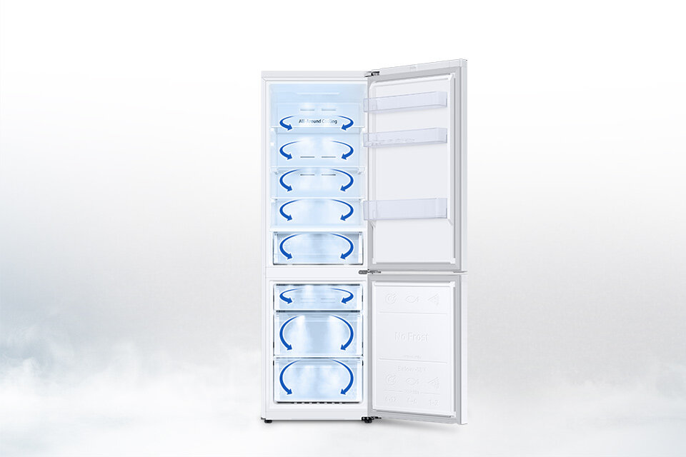 Otwarta na oścież pusta lodówka z zaznaczonymi strzałkami obiegu powietrza Otwarta na oścież pusta lodówka z zaznaczonymi strzałkami obiegu powietrza