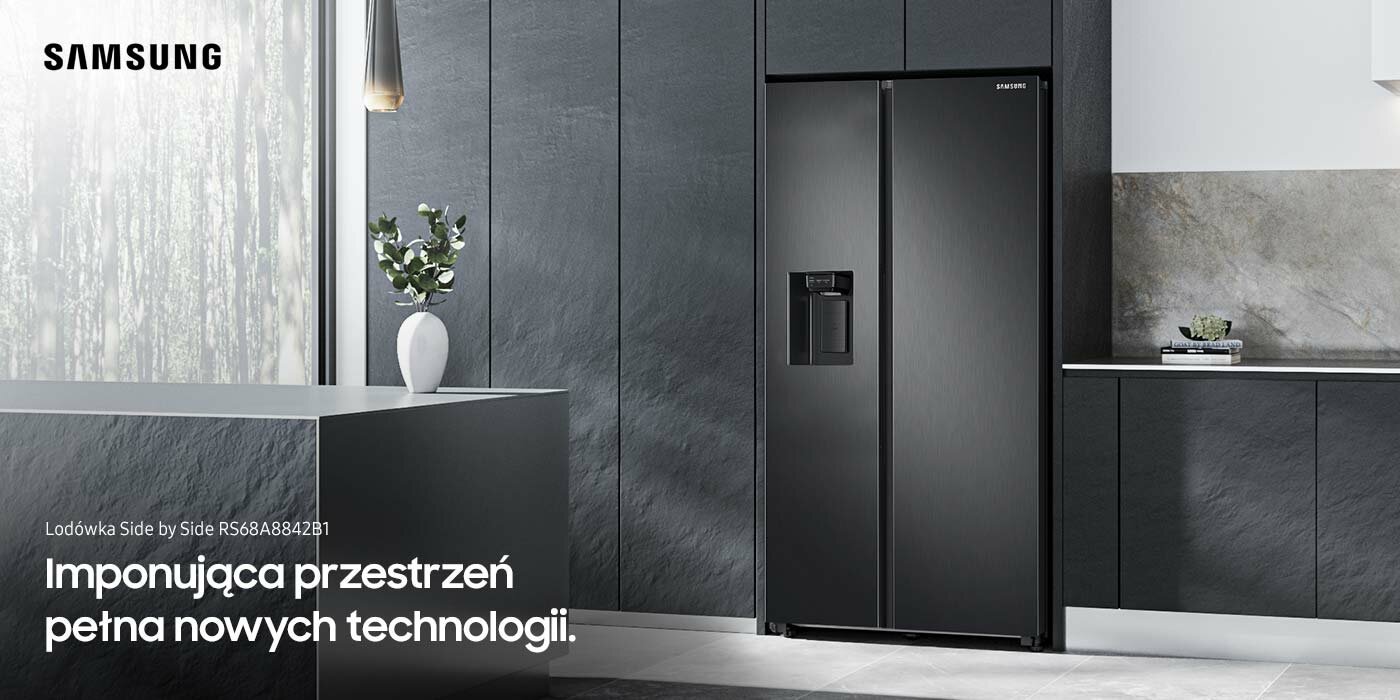 lodówka wykończona w grafitowej stali w ciemnej zabudowie kuchennej lodówka wykończona w grafitowej stali w ciemnej zabudowie kuchennej