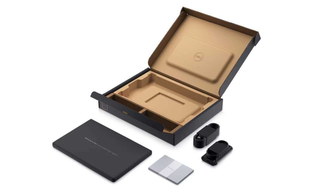 Opakowanie DELL Latitude 5550 zawiera laptop, zasilacz i kable. - materiały przyjazne dla środowiska