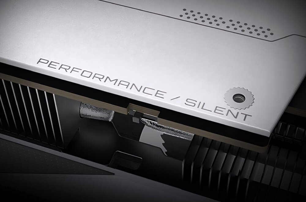 Karta graficzna GIGABYTE GeForce RTX 5070 Ti EAGLE ICE SFF OC 16GB Zbliżenie na przełącznik trybu pracy karty graficznej z opisem Performance / Silent, widoczny również fragment chłodzenia, Dual BIOS, tryby